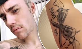 Justin bieber left church on wednesday, and press got quite a surprise when they were able to spy a new bird tattoo on the singer's neck. Justin Bieber Strips Down To Show Off His Massive Tattoo Collection In New Social Media Posts Daily Mail Online