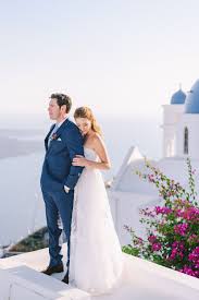 A Romantic Floral Chic Wedding At Rocabella Hotel In Santorini Romantic Sunset Wedding Wedding Photoshoot Santorini Wedding