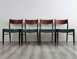 Legs are made of solid beech wood in a light oak. Set Of 4 Mid Century Modern Teak Dining Chairs 1960s 140707