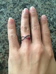 90 imaginative finger tattoos for the unashamed tattoo enthusiast. Infinity Tattoo On Finger Designs Ideas And Meaning Tattoos For You