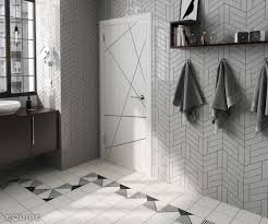 We moved the tub, shower and toilet to different locations to make the bathroom look more organized. Collection Chevron Wall Equipe Ceramicas