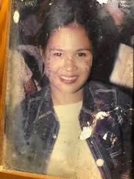 Can anyone make this photo clearer it's one of the last photos of my  sister-in-law before she passsed away 20 years ago