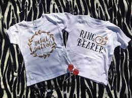 Flower Girl And Ring Bearer Shirts The Perfect Gift For The Little Ones In Your Bridal Party How Adora Flower Girl Shirts Ring Bearer Shirt Ring Bearer Gifts