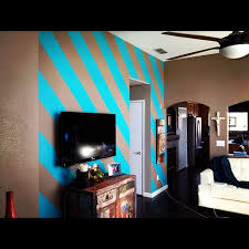 Wall decoration ideas with horizontal stripes. Painted Diagonal Stripes On My Living Room Wall They Were A Nightmare To Mask Out They Re Funky And I Dig Them Striped Room Striped Walls Room Paint