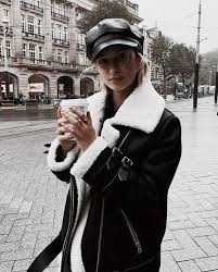 Black And White Coat Click On The Photo To Shop This Amazing Winter Jacket Black Faux Leather White Shearling Warm Women Aviat Street Style Chic Fashion Popular Fashion Trending