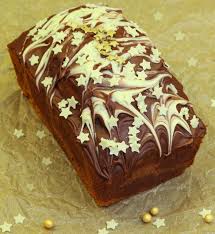 Decorate with a snow shower of icing sugar. Kitchen Delights Christmas Chocolate Marble Loaf Cake