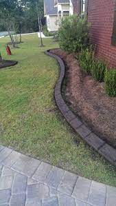 Belgium Block On Angle Curb Color Is Chocolate With Charcoal Outdoor Landscaping Concrete Curbing Landscaping Curbing Landscaping