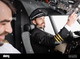 Airline pilot cockpit captain hi-res stock photography and images