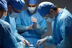 Surgical team performing a procedure in the operating room