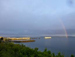 The first order of business is to build a new and much needed ferry dock, which is leased to the state in 1951. Rainbow Over Edmonds Waterfront Edmonds Washington