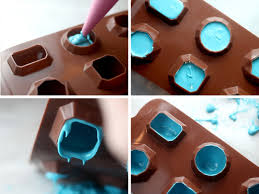 Stick a toothpick through a hole in the mold to determine if the cake pops are done. Candy Jewel Pops Bakerella