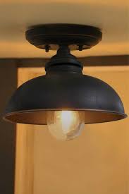 Inspired by some of our favorite wine glasses, this light fixture has a curvy clear glass shade that surrounds one 60 w incandescent e26 medium base bulb (not included) to diffuse ambient light throughout your space. Whitby Outdoor Close To Ceiling Light Exterior Lights Fat Shack Vintage