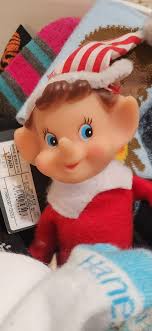 I cant find him in my attic!!! All the elves i see have plain red hats. Any  tips?