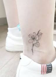 Black And White Cherry Blossom Thigh Tattoo Delicate Black Cherry Blossom Ankle Tattoo Ideas For Women Small Flower Leg Tat Www Mybodiart Com Tattoo Ankle Tattoo Blossom Tattoo Cherry Blossom Tattoo