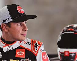 Who was driving the Action Cycles sponsored car at the old track at Tulsa?