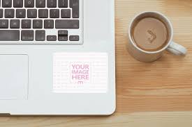 Download Rectangle Sticker Mockup On Laptop With Coffee Mediamodifier