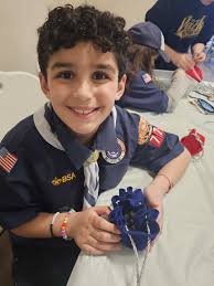 Cub Scouts Play Marble Games at Mind Benders