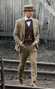 What did men wear in the 1920s? Great Gatsby S Tobey Maguire Is All Tied Up In A Bow E Online 1920s Mens Fashion Mens Outfits Derby Outfits