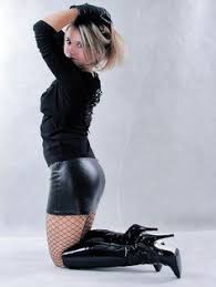 Kinky redhead audrey dped in stockings and boots. Leather Mini Skirts