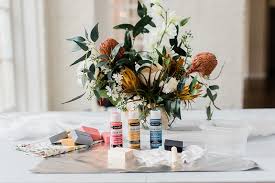 I've made these diy place card holders that could be used for assigned seating or identifying food at buffet. Diy Colorful Wood Place Card Holders Tidewater And Tulle Coastal Virginia Wedding Blog And Magazine