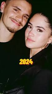 Romeo Beckham and Kim Turnbull in Paris