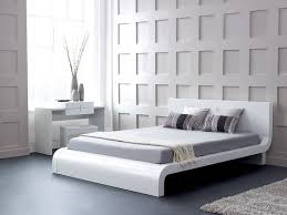 Bright white and gold hotel room highlighted with bold orange wall behind filigreed head board. Ultra Modern Modern White Bedroom Furniture Novocom Top