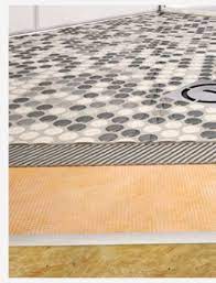 Vinyl floors are a popular option among homeowners, particularly in kitchen and bathroom applications. Can Schluter Ditra And Schluter Ditra Xl Be Installed Over Vinyl Flooring Schluter Com Shower Niche Old Bathtub Linear Drain Shower