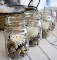 Pebble Stones In Ball Jar With Candles Cute Simple Kind Of Rustic Idea For Decorating Deck Decorating Ball Jars Mason Jars