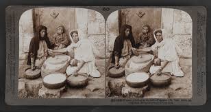 Women grinding at the mill--Palestine (St. Matt. xxiv; 41) | Photograph | NNL_ARCHIVE_AL997009563189205171 | The National Library of Israel