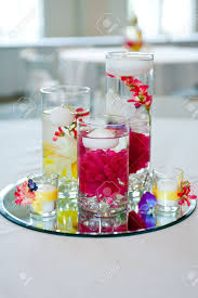 Wedding centerpieces candles and flowers. Wedding Centerpiece With Floating Candles And Flowers Stock Photo Picture And Royalty Free Image Image 7009708