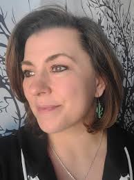 Elli, this sweet friend of Webber's has made these adorable earrings to  help several charitable groups. One of the groups is Katie's Caps. Webber,  Morris and Payne can't thank her and Carrie