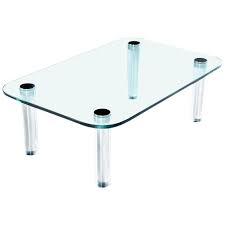 Modern clear and black glass mix coffee table consists of a clear and black glass coffee table top with elegant glass shelf and chrome legs and will clearly be the focal point to your living room. Pace Collection Chrome And Lucite Screw Leg And Glass Coffee Table By Leon Rosen Chairish