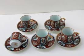 Describe your piece in the simplest manner possible. Vintage Tea Pots Tea Cups And Saucers