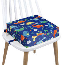 Toddler booster seats are a great help when it comes to feeding your baby. Toddler Booster Seat Dining Cartoon Canvas Washable 2 Straps Safety Buckle Kids Booster Seat For Dining Table Portable Travel Increasing Cushion Dinosaur Blue Buy Online In Aruba At Aruba Desertcart Com Productid 201956239