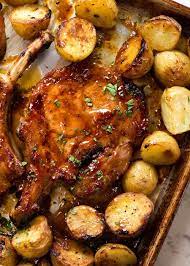 As pork chops brown on the other side, stir garlic slightly and ladle butter/oil, lemon juice, and garlic from pan over the pork. Oven Baked Pork Chops With Potatoes Recipetin Eats