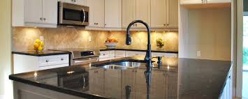 Ribbed glass in selected wall cabinets. Granite Kitchen Countertops As A Superb Material For Family Friendly Kitchen