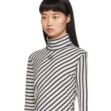 From cozy cashmere cardigans to sparkly sweaters, our season knitwear collection has options that work for day and night. Loewe Navy And White Striped Long Sleeve Turtleneck Loewe