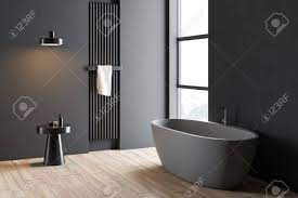 This particular bathroom, featuring benjamin moore's warm rockport gray, as well as a custom vanity, is perfect for traditionalists at heart. Corner Of Minimalistic Bathroom With Dark Gray Walls Wooden Stock Photo Picture And Royalty Free Image Image 120867213