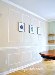 The dining room is blue and yellow. How To Add Picture Frame Molding To Your Home