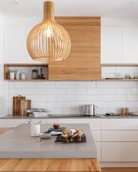 The Perfect Balance Between Fresh Matt White Cabinetry Timber Finishes The Industrial Look Feel Of Caesa Timber Kitchen White Modern Kitchen Scandi Kitchen