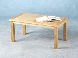 Solid wood planks and thick veneer merge seamlessly together for a hearty helping of style. Cadoret Ash Coffee Table