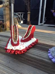 If you are looking at sending a message of condolence you can browse our range of sympathy flowers. Funeral Flowers Red Shoes Funeral Flower Tribute Glitter Red Shoes Funeral Funeral Flowers Funeral Floral Arrangements Funeral Flower Arrangements