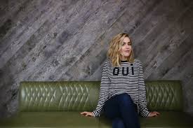 Actress Kiernan Shipka Poses On Louis Interiors Banquettes At Figo Restaurant During Tiff In Toronto