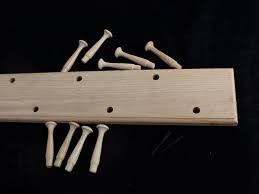 And they always fit perfectly on your wall because we sell ours by the inch. Unfinished Oak Cherry Maple Double Row Peg Rack Made In The Usa