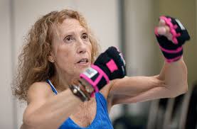 Janet Enos of Plymouth teaches boxing fitness to Marshfield seniors