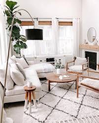 Non Traditional Living Room With A Fluffy Wool Rug Which Looks Great With Th White Living Room Decor Scandinavian Decor Living Room Beige And White Living Room