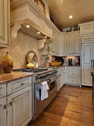 Love Distressed White Kitchen Cabinets With A Black Chunky Island Distressed Kitchen Cabinets Distressed Kitchen Rustic Kitchen Cabinets