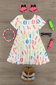 Discover more beautiful designer dresses for kids online at childrensalonoutlet.com. White Pastel Alphabet Dress In 2021 Unique Childrens Clothing Simple Dresses Dresses