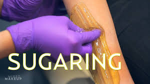 A licensed aesthetician applies the sugar paste. Sugaring Is Our New Favorite Hair Removal Technique The Sass With Sharzad And Susan Youtube