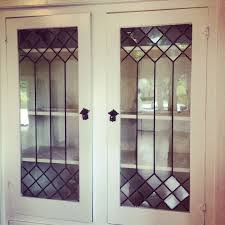 The leaded effect can be used with glass (top image) or with mirror (bottom image) with equally good results. 7 Leaded Glass Cabinets Ideas Leaded Glass Cabinets Leaded Glass Glass Cabinet Doors
